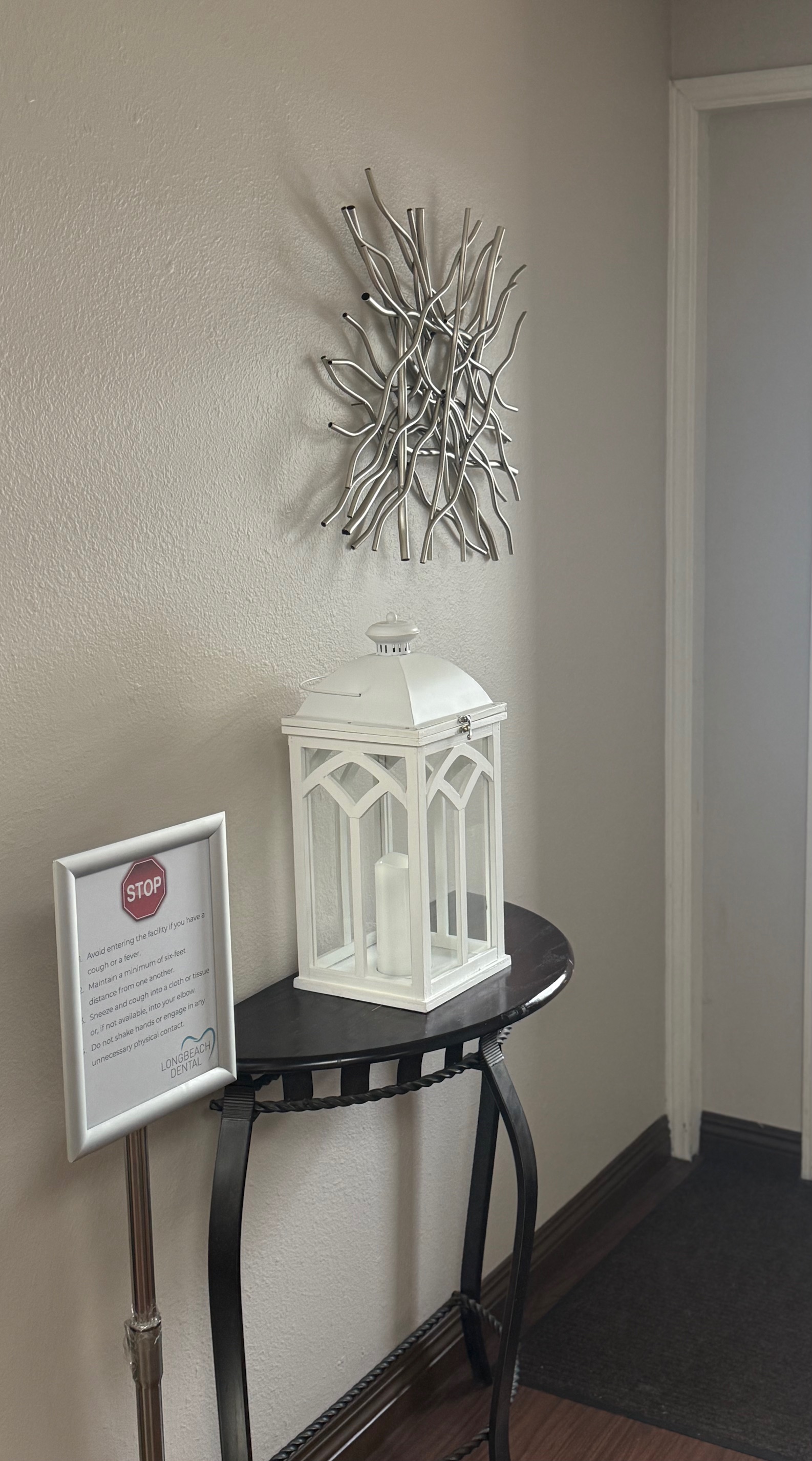 Long Beach Dental Practice office decor with health guidelines